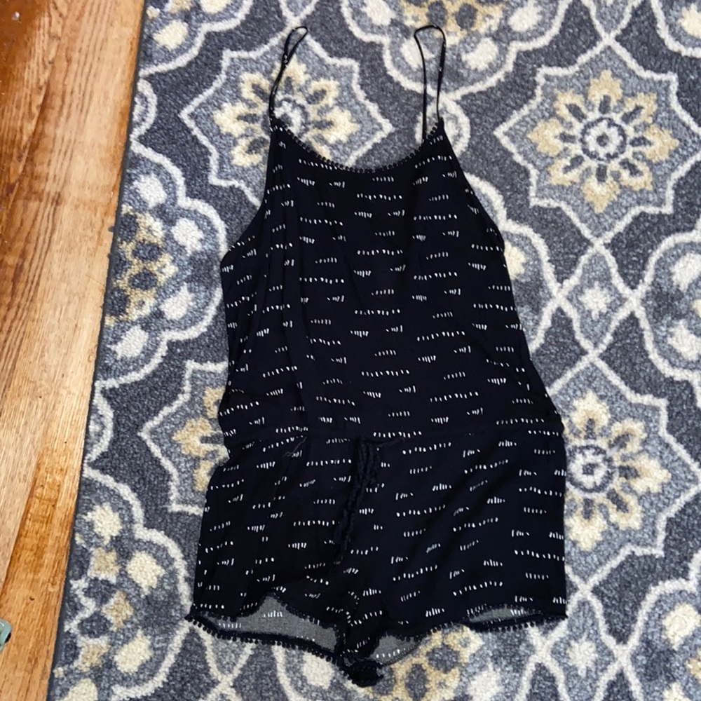 Black romper / white pattern romper